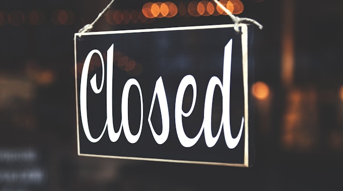 Bokeh Photography Of Closed Signage