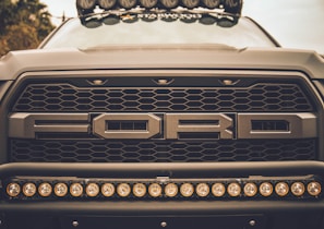 closeup photo of brown Ford vehicle