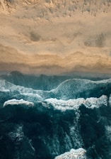 aerial photo of sea water and seashore