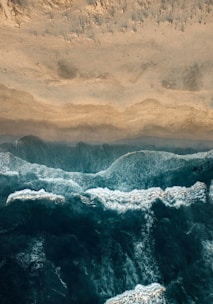 aerial photo of sea water and seashore