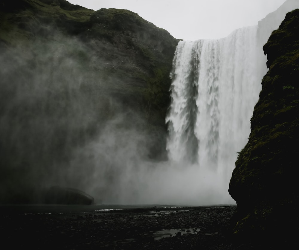 photo of mountain waterfalls