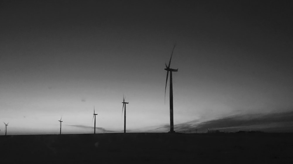 silhouette of windmills