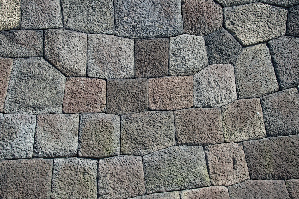close up photography of concrete brick pavement