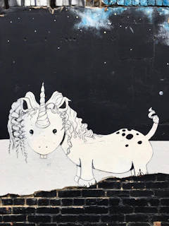 white and black unicorn mural