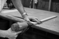 person doing wooden frame