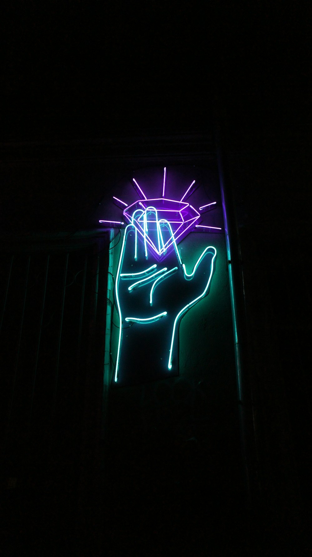 hand and purple diamond lase lights