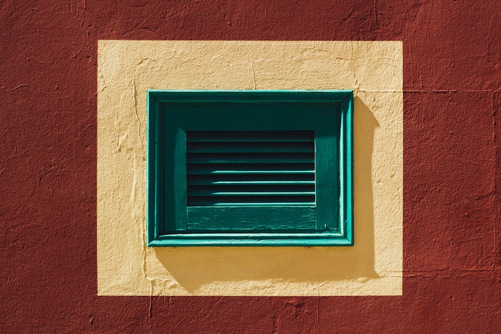 photo of green wooden window during daytime