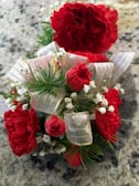 A close-up of a beautifully crafted corsage with vibrant colors.