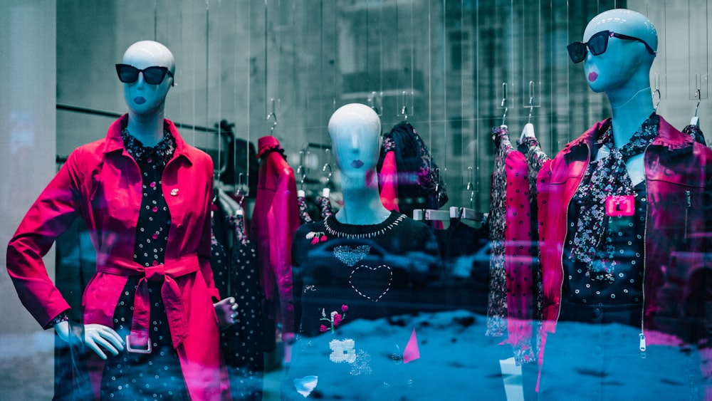 women's red coat on white mannequin