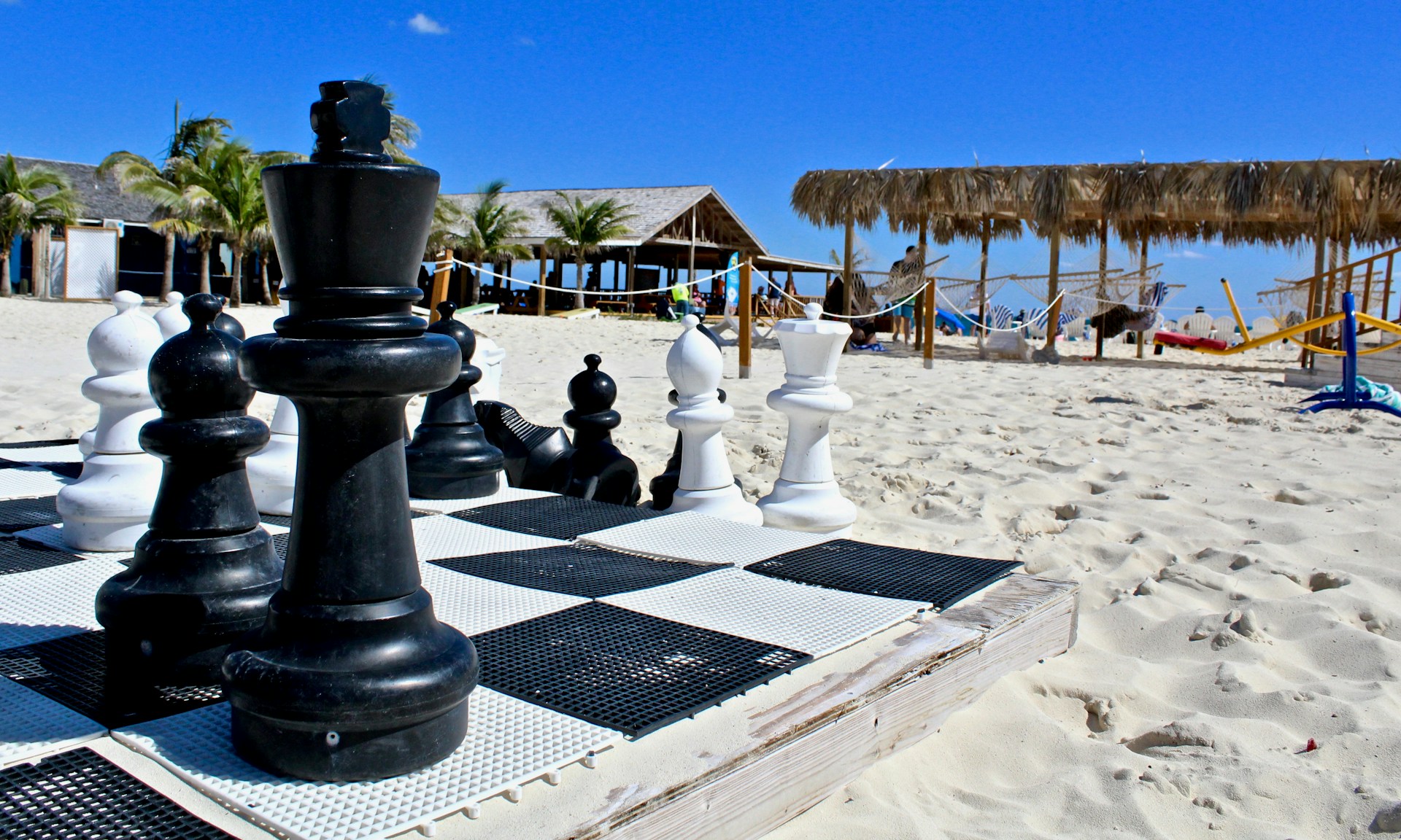 woman wearing yellow long-sleeved dress under white clouds and blue sky during daytime