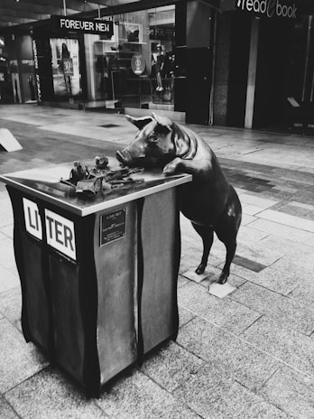 An abstract representation of urban life with pig motifs.