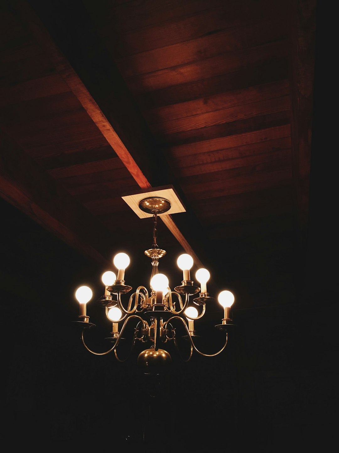 turned-on uplight chandelier