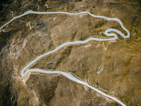 aerial photography of concrete road in The Remarkables New Zealand