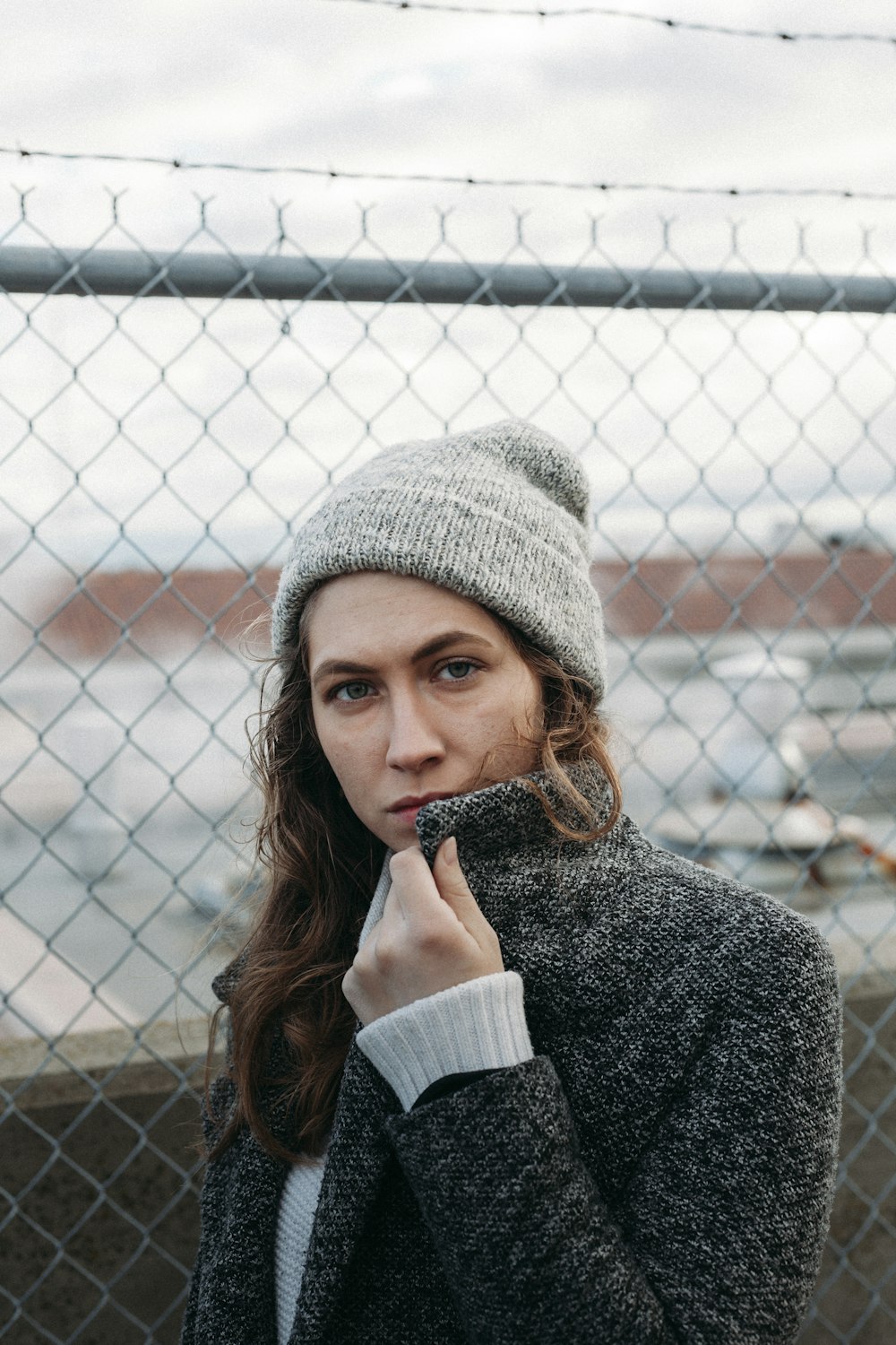 woman wearing gray knit cap