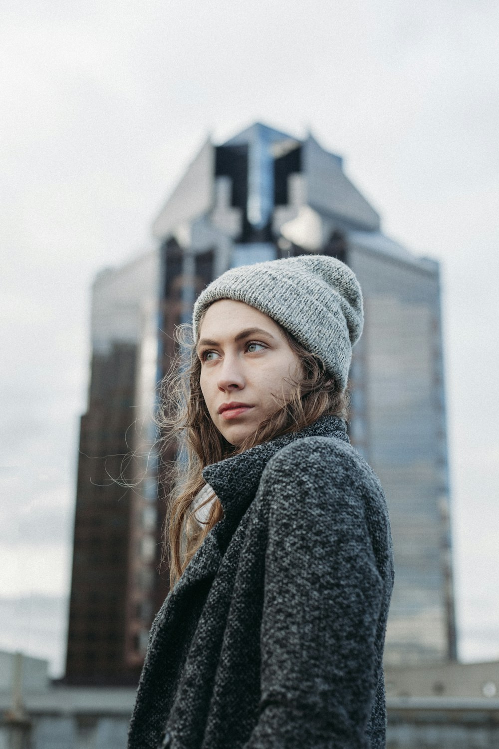 selective focus photography of woman wearing coat