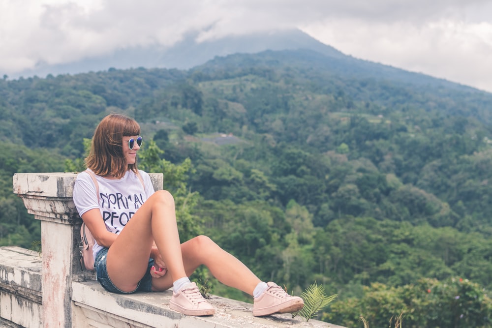 woman sitting on terrace