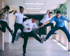 group of people doing jump shot photography