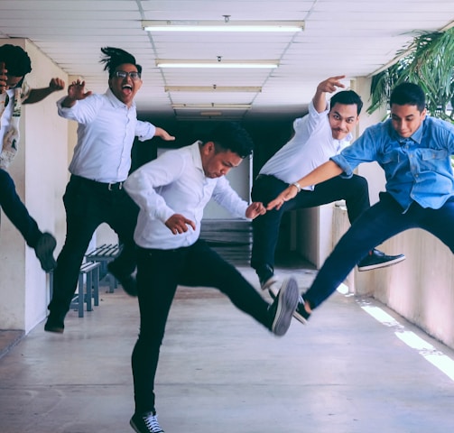 group of people doing jump shot photography