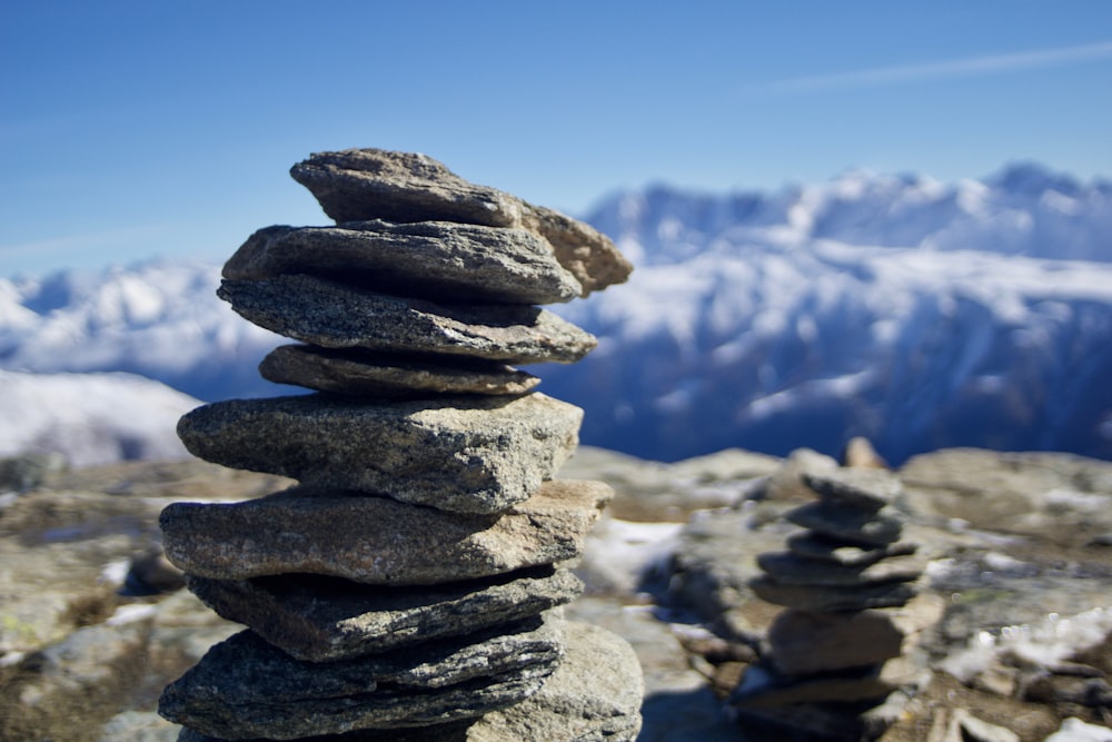 pile of rocks under blue sky at daytime