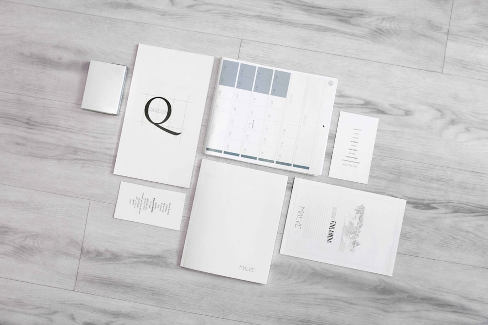 flat-lay photography of white printer papers