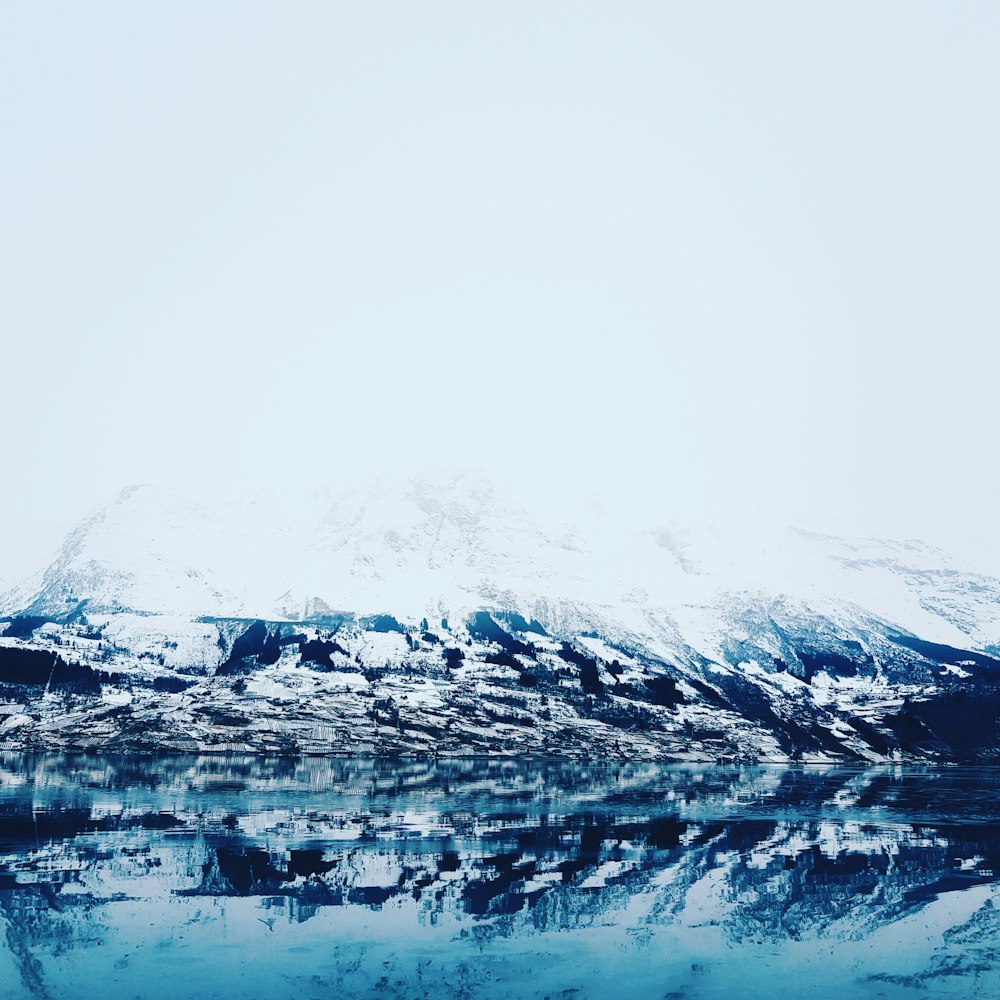 gray mountains covered with white snows