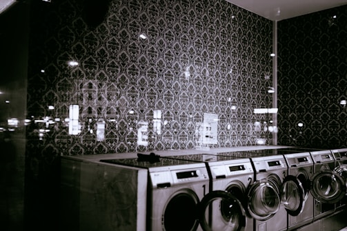 photography of gray washer and dryer during daytime
