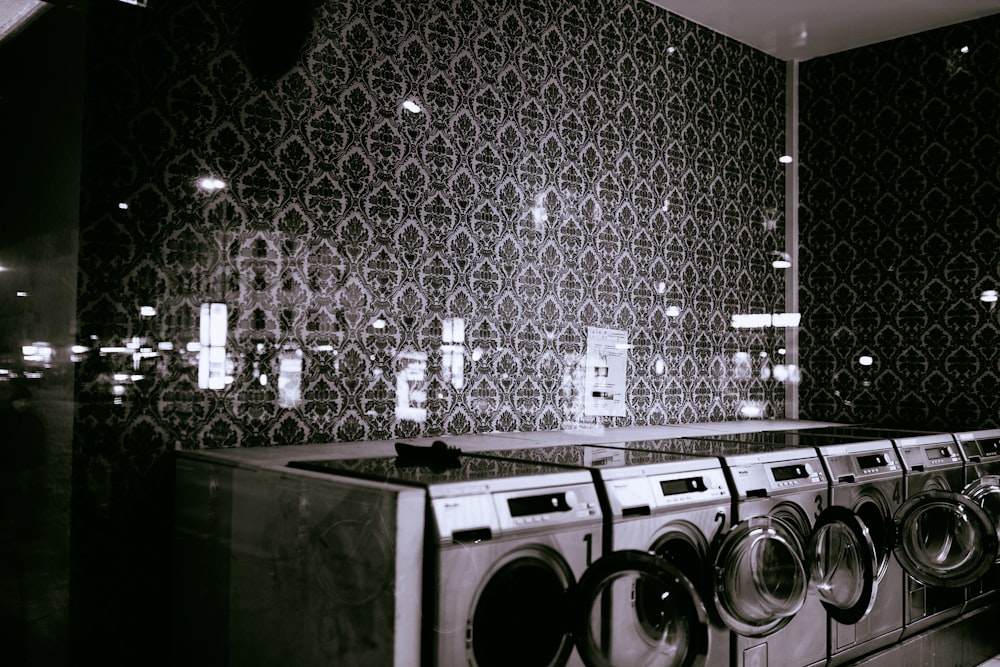 photography of gray washer and dryer during daytime