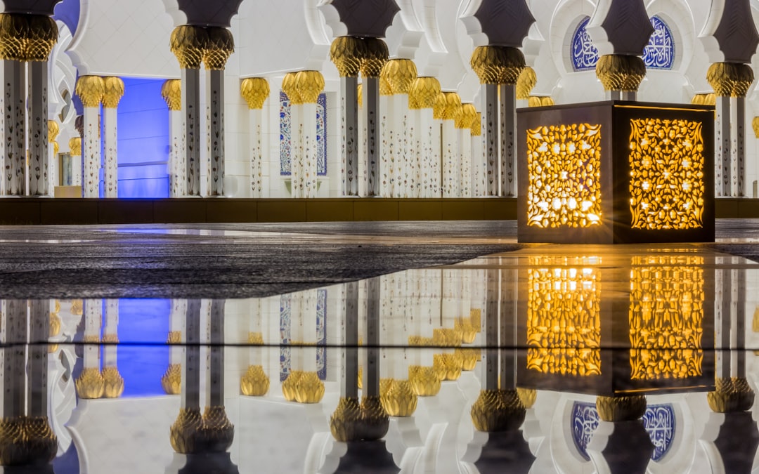 photo of white and black concrete structure, Sheik Zayed Grand Mosque is a special place for me because it is, undoubtfully, the most beautiful majestic building I have seen.<p></figure>It is special for me because it’s one of the places where I was able to practice photography as I was just starting out with it. And what an incredible place to photograph.</p><p>This picture was taken towards the end of my trip that day and I did not expect this result.</p><p>It’s still my favorite picture of the place.