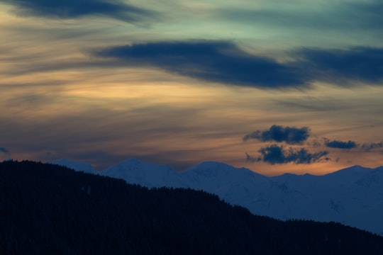 silhouette photography of mountain in Obereggen Italy