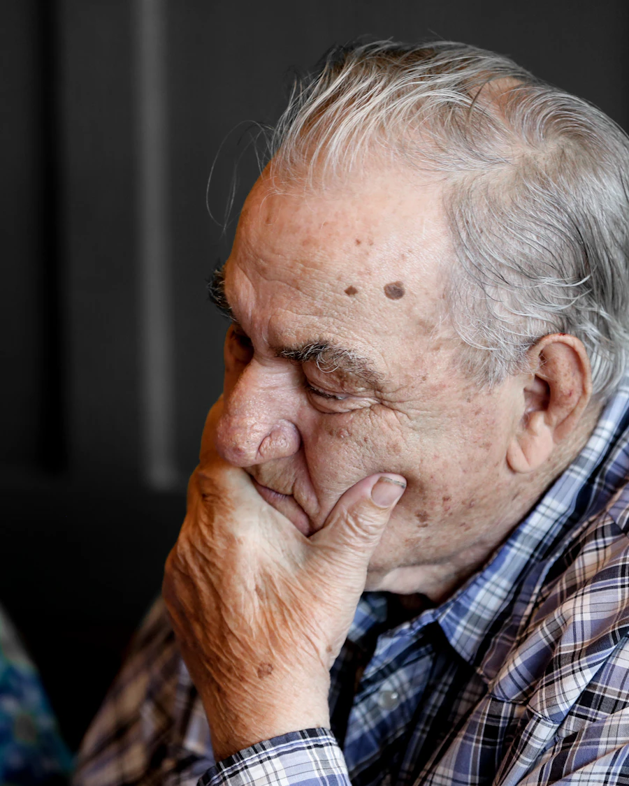A carer reviewing a care plan document with a client