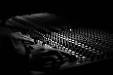 grayscale photography of mixing console