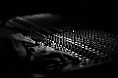 grayscale photography of mixing console