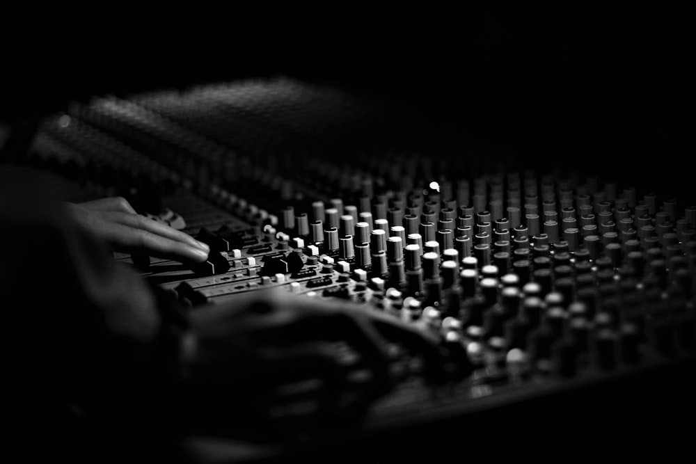 grayscale photography of mixing console