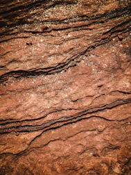 a close up of a rock surface with water