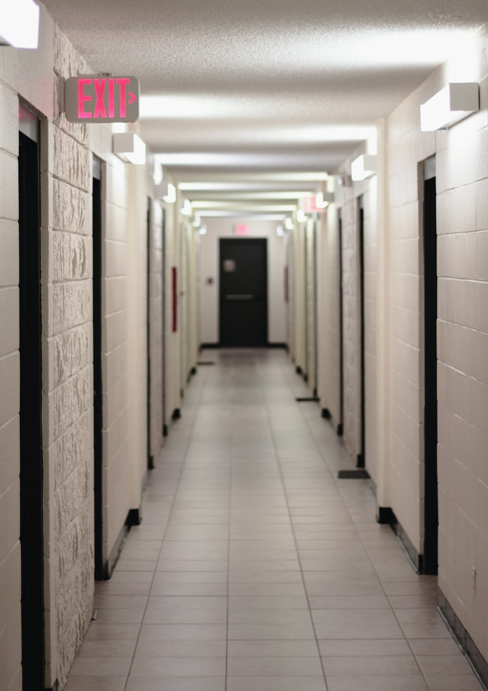 pathway with multiple doors leading to fire exit