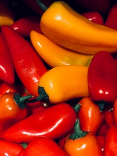 A colorful assortment of peppers ready for sale.