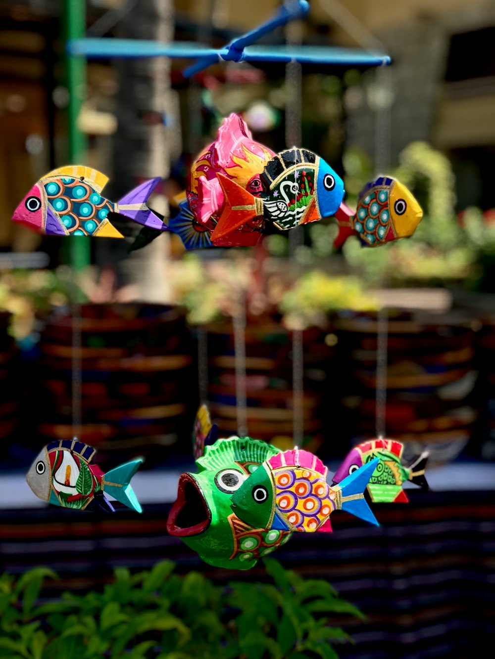 selective focus photography of fish hanging decor