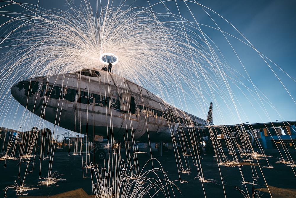 time lapse photo of steel wool and plane