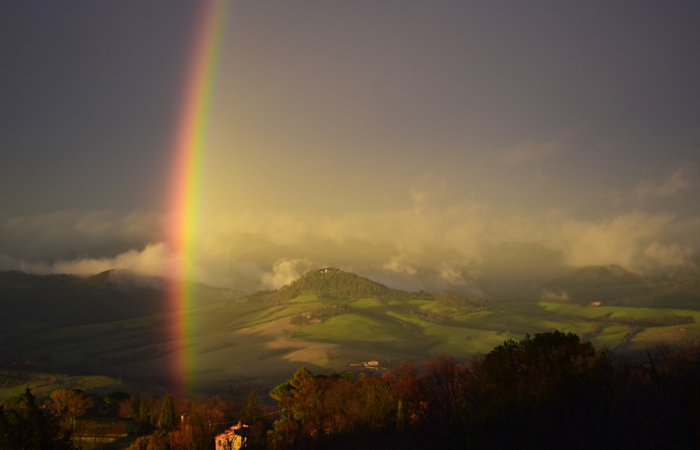 rainbow near mountain