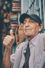 man making thumbs up sign