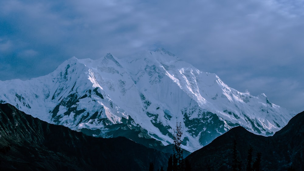 snow covered mountain during daytime