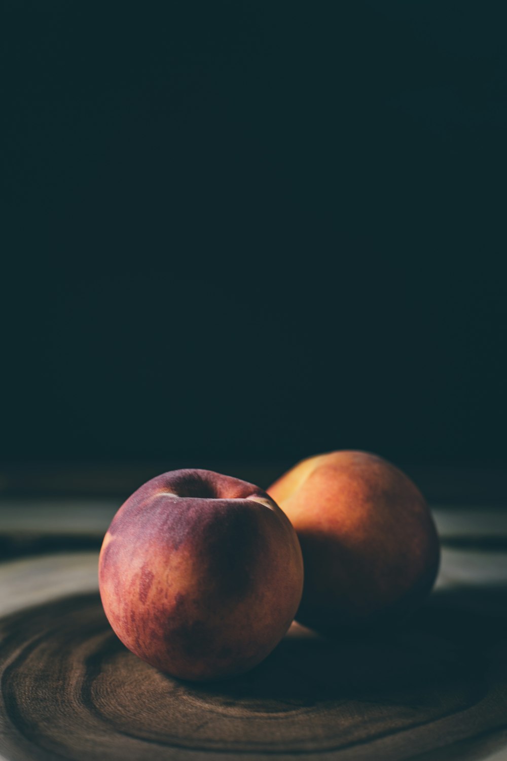 two apples on table