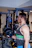 man lifting 40 LBS. dumbbell inside gym