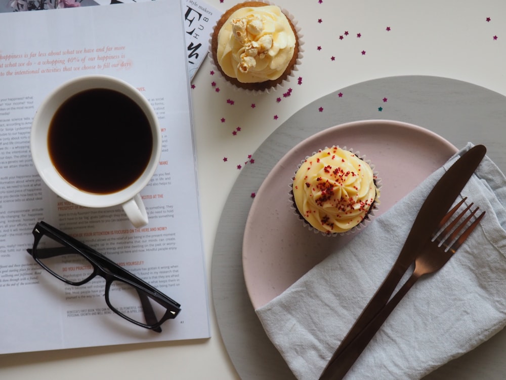 cupcake beside fork and knife