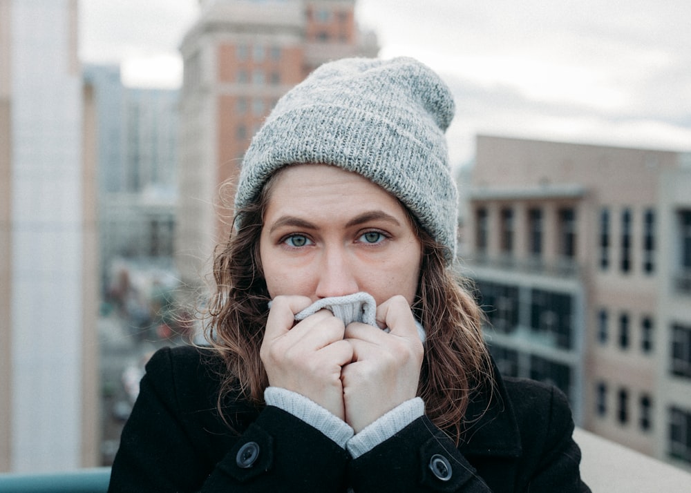 Woman wearing hat and jacket