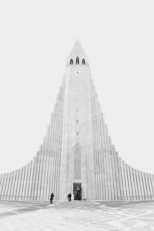 grayscale photo of gray concrete building in Hallgrimskirkja Iceland
