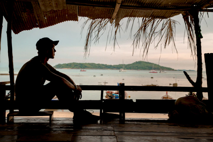 Man looking at the ocean