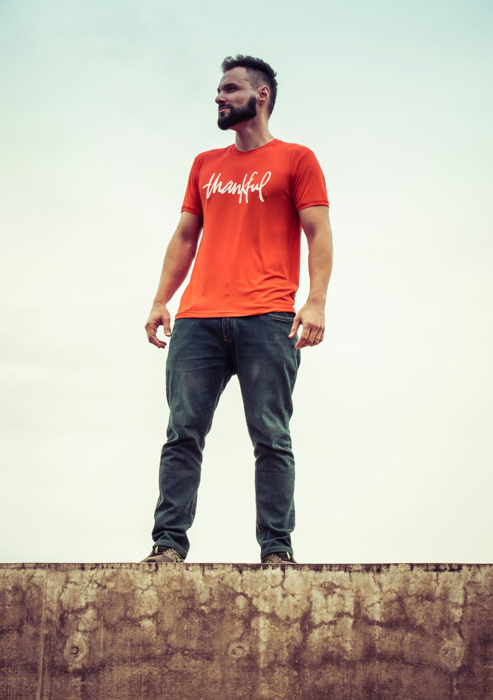 man standing on gray surface