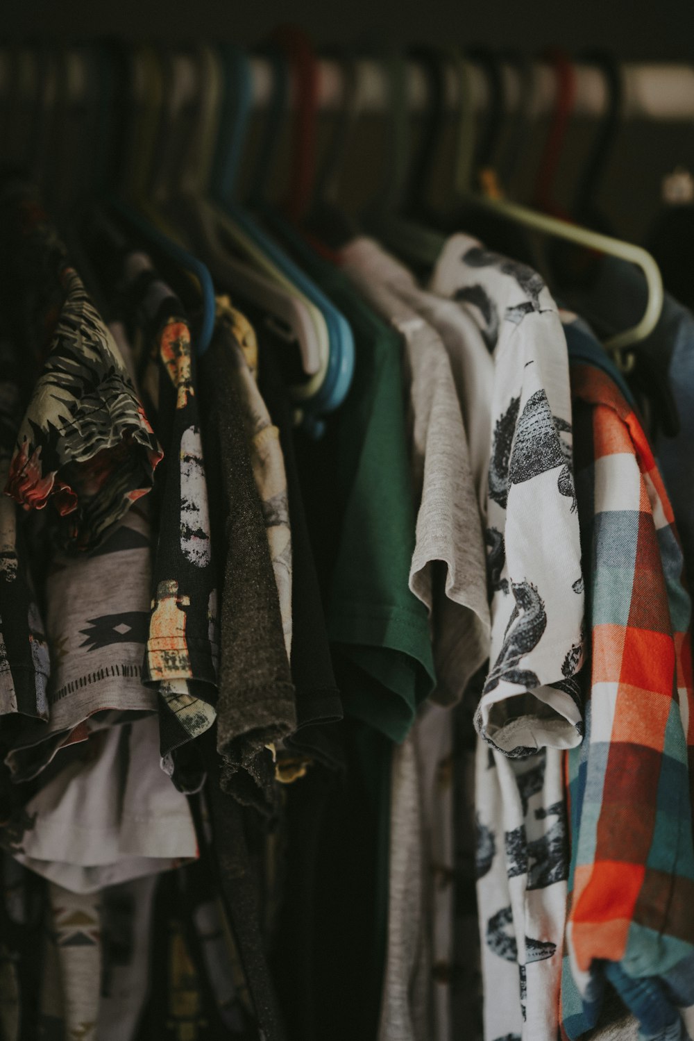 shallow focus photo of assorted clothes