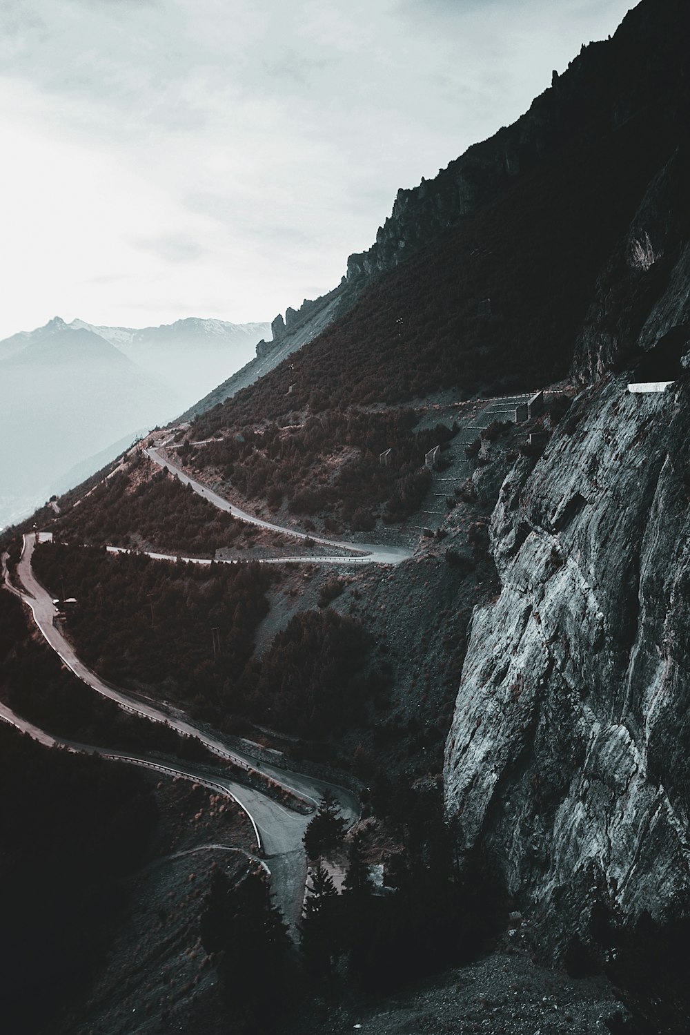 landscape photography of zig zag road on mountain